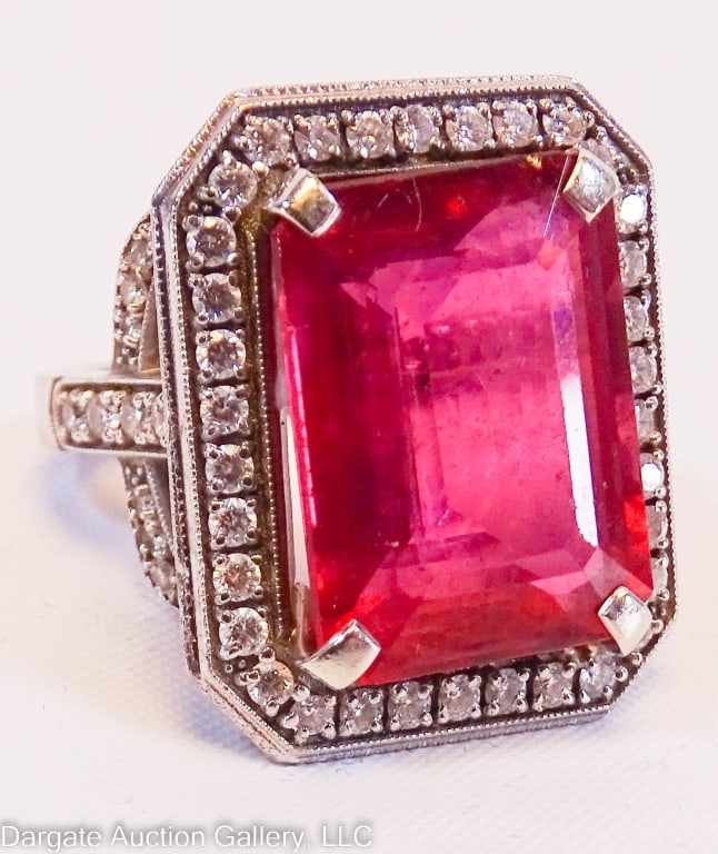 PLATINUM DIAMOND AND RUBELILITE TOURMALINE RING: Tourmaline: 12.59mm x 17mm estimated 13ct / marked under guard and tested / Weight: 25.3g / Measurements: size 4/ ONLINE PAY MSG ****SEE TERMS AND CONDITIONS FOR SPECIAL PAYMENT REQUIREMENTS****