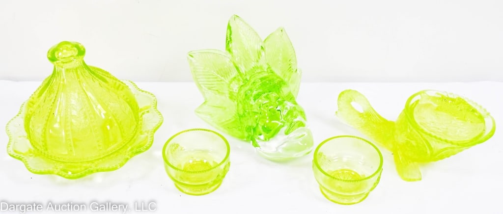 VASELINE URANIUM SUMMIT GLASS LORANTO SPRING HEAD: 5 pieces of late 20th century & modern Vaseline yellow uranium Summit glass, Loranto spring head. Holly Berry butter dish. Butter dish holly berry 7/25" diam x 5.5" H. Head 5.5" x 6"x 6" H. Fish dish 