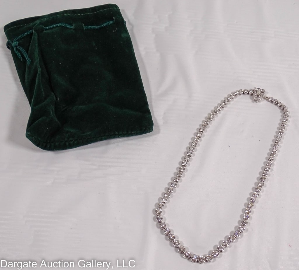 PLATINUM DIAMOND RIVIERE NECKLACE APPRX 22 CTTW: 75 diamonds in graduated sizes ranging from 3.3mm to 5.1mm. Modern brilliant cut, old mine cut and old European cut diamonds, total estimated carat weight: 22cttw / Marked 900 PLAT / Weight: 43.7g tot