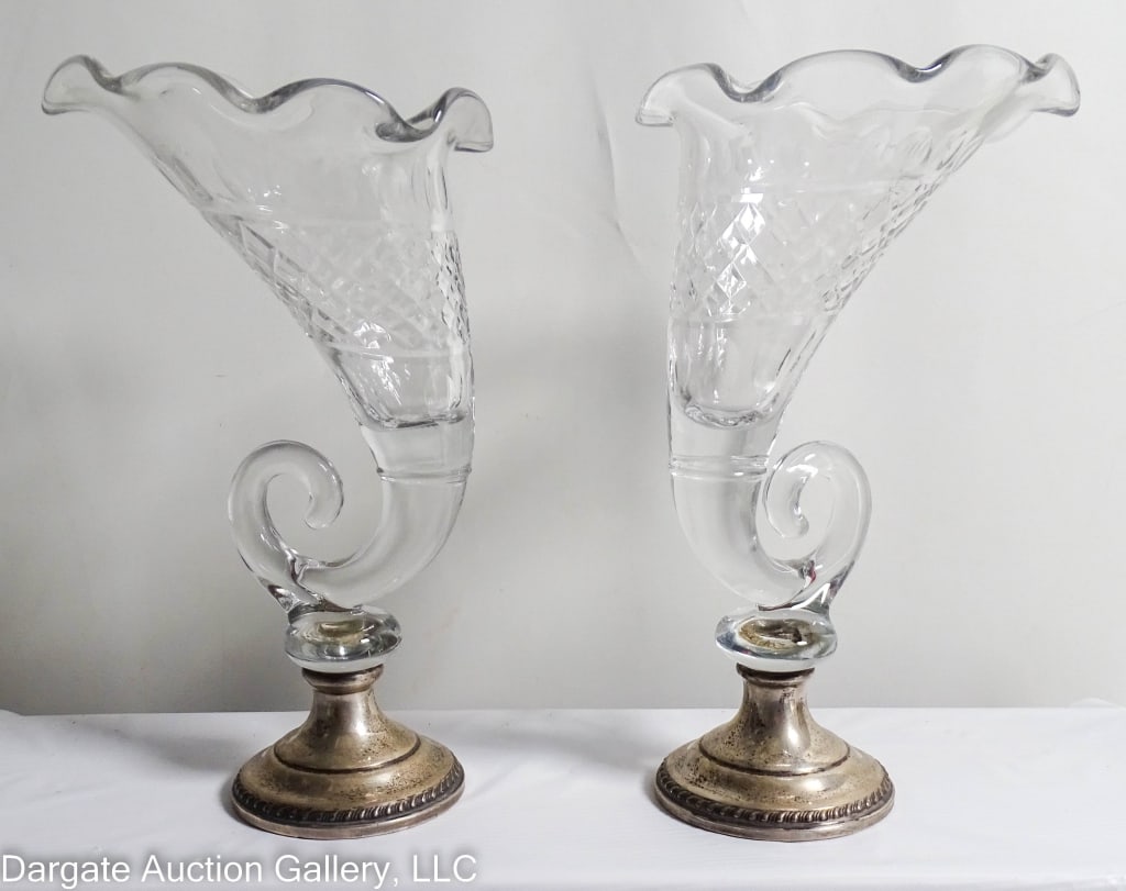 PAIR CAMBRIDGE GLASS/SHEFFIELD STERLING VASES: A pair of Cambridge Glass cornucopia vases, with the King Edward Cutting Sheffield Sterling bases. Marked [Sheffield Silver Company]. / Measures: 11"H x 6.25" W / Provenance: From the descendants of L
