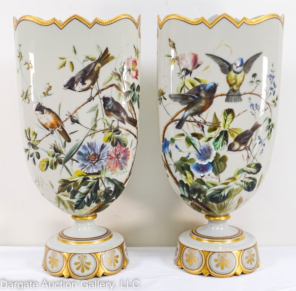 IMPRESSIVE PAIR HANDPAINTED GREY BRISTOL VASES: A pair of hand painted grey Bristol vases with birds among flowers & foliage. Gold and white enameled rims & details. Unusual grey color. / Measures: 17" H x 8" W x 4.5" D / Provenance: From the desce