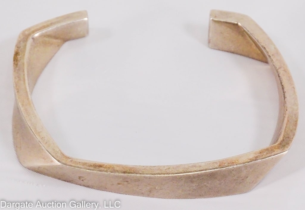 TIFFANY & CO FRANK GEHRY STERLING CUFF BRACELET: Tiffany & Co Frank Gehry Sterling silver modernist design cuff bracelet; marked TIFFANY & CO GEHRY 925 / Weight: 70.65g / Measurements: 2.75"W / Provenance: From the descendants of Lollie Oliver, Pitt