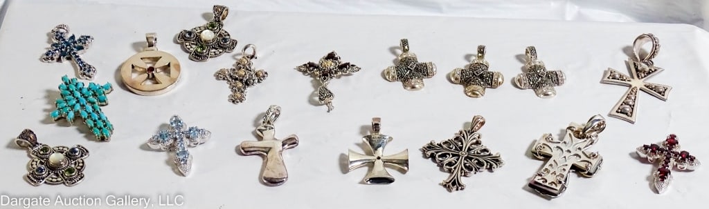 17 ASST STERLING SILVER CROSS PENDANTS: Includes: Robert Lee Morris Studio, 16.03g, 2?H, marked on bale RLM STUDIO 925 CHINA / Barry Kieselstein Cord Sterling Maltese cross, set with a central round garnet, 18.39g, 1.25?; marked KC STUDIO [