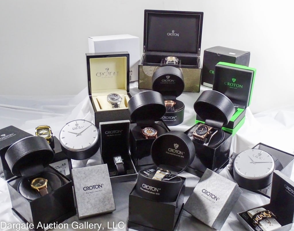 12 CROTON WATCHES IN ORIGINAL BOXES: Includes: Dragon Automatic (runs); Black dial w/dragon around bezel on front & back; Stainless Steel; 50m WR / CN307217; Rosetone; Stainless Steel; Quartz; 30m WR; Black lizard leather band / Vortex C