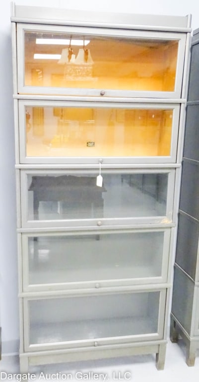 5-STACK HALE BARRISTER BOOKCASE: 5 stacking section Barrister bookcase made by Hale Co Herkimer NY with base & top / wooden knobs, (3) 12"H sections and (2) 13"H sections / Measures: 78"H x 34"W x 11.25"D / Condition: Good overall us