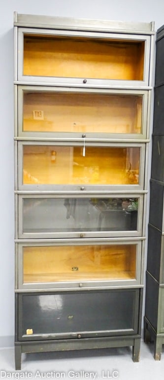 6-STACK HALE BARRISTER BOOKCASE: 6 stacking section Barrister bookcase made by Hale Co Herkimer NY with base & top / wooden knobs, (4) 12"H sections and (1) 13"H sections AND (1) 11"H section / Measures: 91"H x 34"W x 11.25"D / Condi