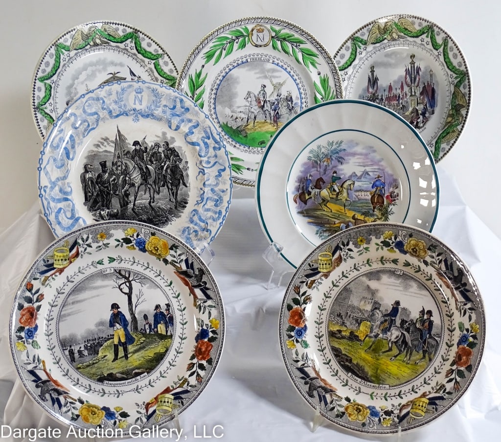 A GROUP OF TRANSFERWARE PLATES DEPICTING NAPOLEON: A grouping of 7 transferware plates depicting Napoleon. (1) Bock Freres Keramis, (3) Porcelain Opaque Creil et Montereau, (1) Potsdam Pierre Regout, (2) Louis Lebeuf Montereau. Marked as described. La