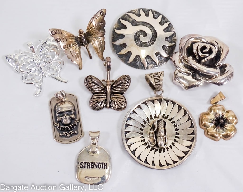 9 ASSORTED STERLING SILVER PENDANTS: Includes: Rose [925 THAILAND] / Joseph Esposito Butterfly [925 ESPO SIG] / Butterfly [R 925 CHINA] / Butterfly Clip [MEXICO 925 CII] / flower [MEXICO CII 925] / Joseph Esposito Tree/Strength pendant [