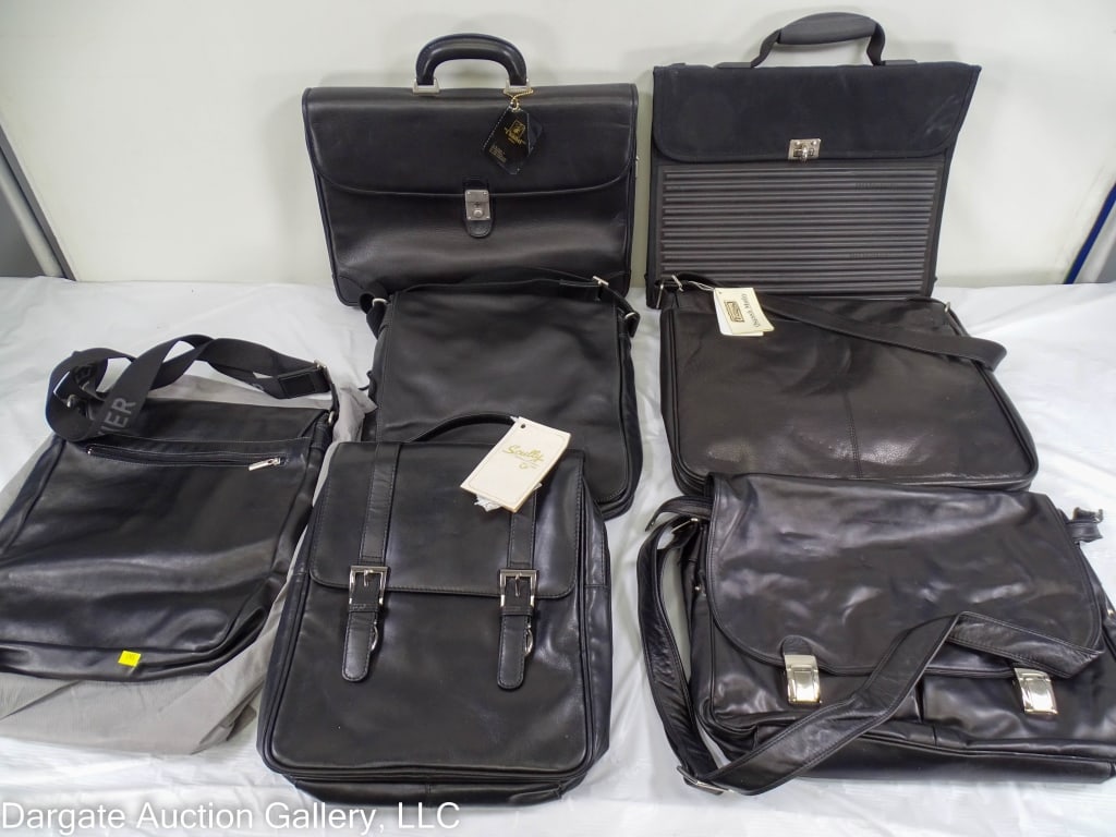 7 ASSORTED LEATHER BRIEFCASES AND MESSENGER BAGS: Includes: (2) Textier black leather message bags / Scully leather backpack/bookbag / L Bagagerie messenger bag (slight wear on base - oetherwise barely used) / Osgoode Marley messenger bag with tags /