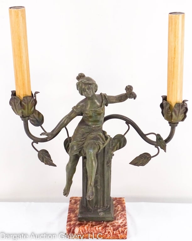 SPELTER VICTORIAN STYLE LADY CANDELABRA PARIS: Victorian style spelter 2-light candelabra with young girl sitting on pillar and holding a flower. Marble base. Marked on back Fabrication Francaile Paris Made in France. / Measures: Marble base is 3.