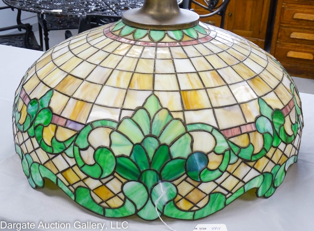 LARGE LEADED GLASS HANGING LIGHT SHADE: Nice large leaded glass hanging ceiling light shade. Caramel glass with several shades of green and rose colored bands. 24" diameter. / Measures: 10.5"H / Condition: Some panels cracked, mostly in the