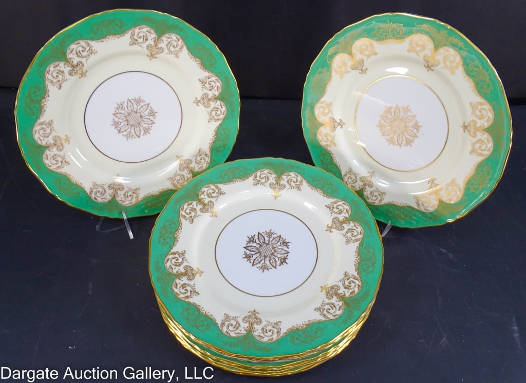 SET 12 ROYAL WORCESTER GREEN/CREAM DINNER PLATES: Set of 12 Royal Worcester green/cream dinner plates. Marked [Royal Worcester]. / Measures: 10.5" D / Provenance: From the descendants of Lollie Oliver, Pittsburgh, PA / Condition: No chips, cracks or