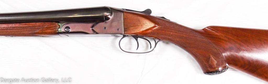 WINCHESTER 1930 MODEL 21 SIDE BY SIDE 12G SHOTGUN: Winchester Model 21 Serial No 1208, dating from 1930, side by side shotgun, grade 2 wood, ivory center bead, brass front bead, double trigger, clean bores / Measures: 28" barrels, 14" length of pull /
