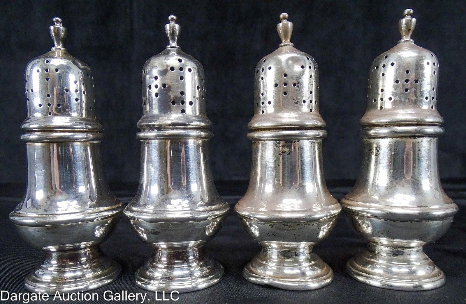 4 REDLICH & CO STERLING SALT SHAKERS: Four Sterling salt & pepper shakers [Sterling, Redlich & Co] / Weight: Total Gross Weight: 162.9g / Measurements: 4"H x 1.5" diameter / Condition: A few dents, some discoloration/ ONLINE PAY MSG ****S