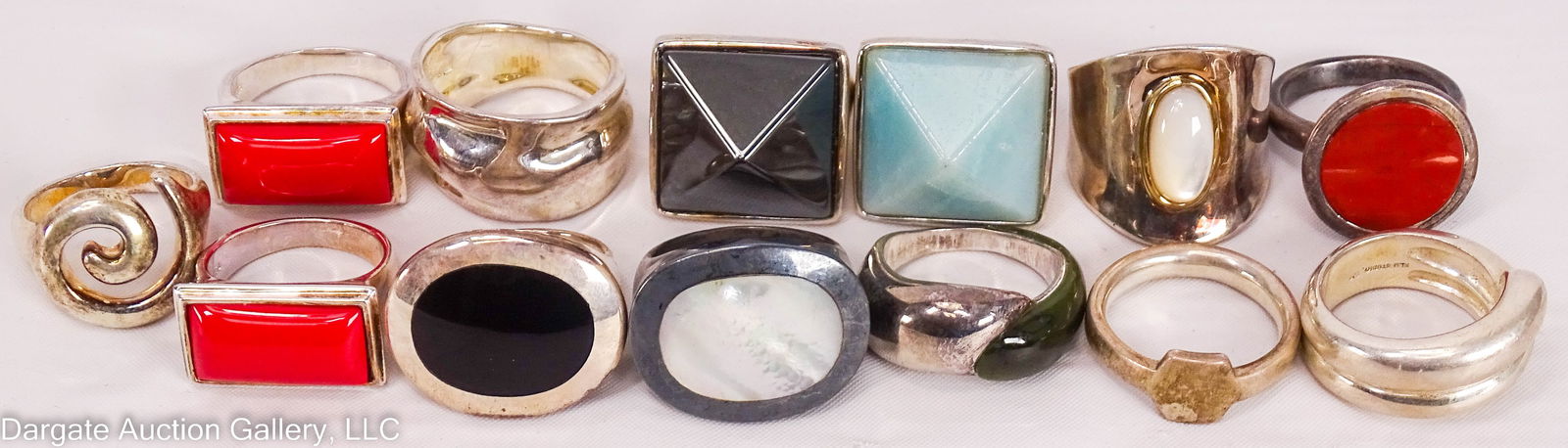13 ASST RLM STUDIO STERLING RINGS: Robert Lee Morris Studio, all marked [RLM STUDIO 925 CHINA]; Includes: Size 10 Sterling, brass and mother of pearl ring [also marked BRASS]; (2) Pyramid style rings – Size 10 Larimar, Size 9 Mother