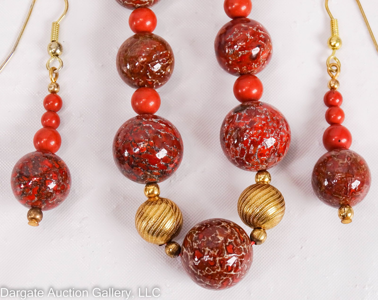 2pc FOSSILIZED DINOSAUR BONE JEWELRY SET: 24"L necklace with twist closure; Dinosaur bone, jasper and gold tone beads alternated in graduated sizes and a matching pair of pierced earrings / Measurements: 24"L/ ONLINE PAY MSG ****SEE TERMS AND