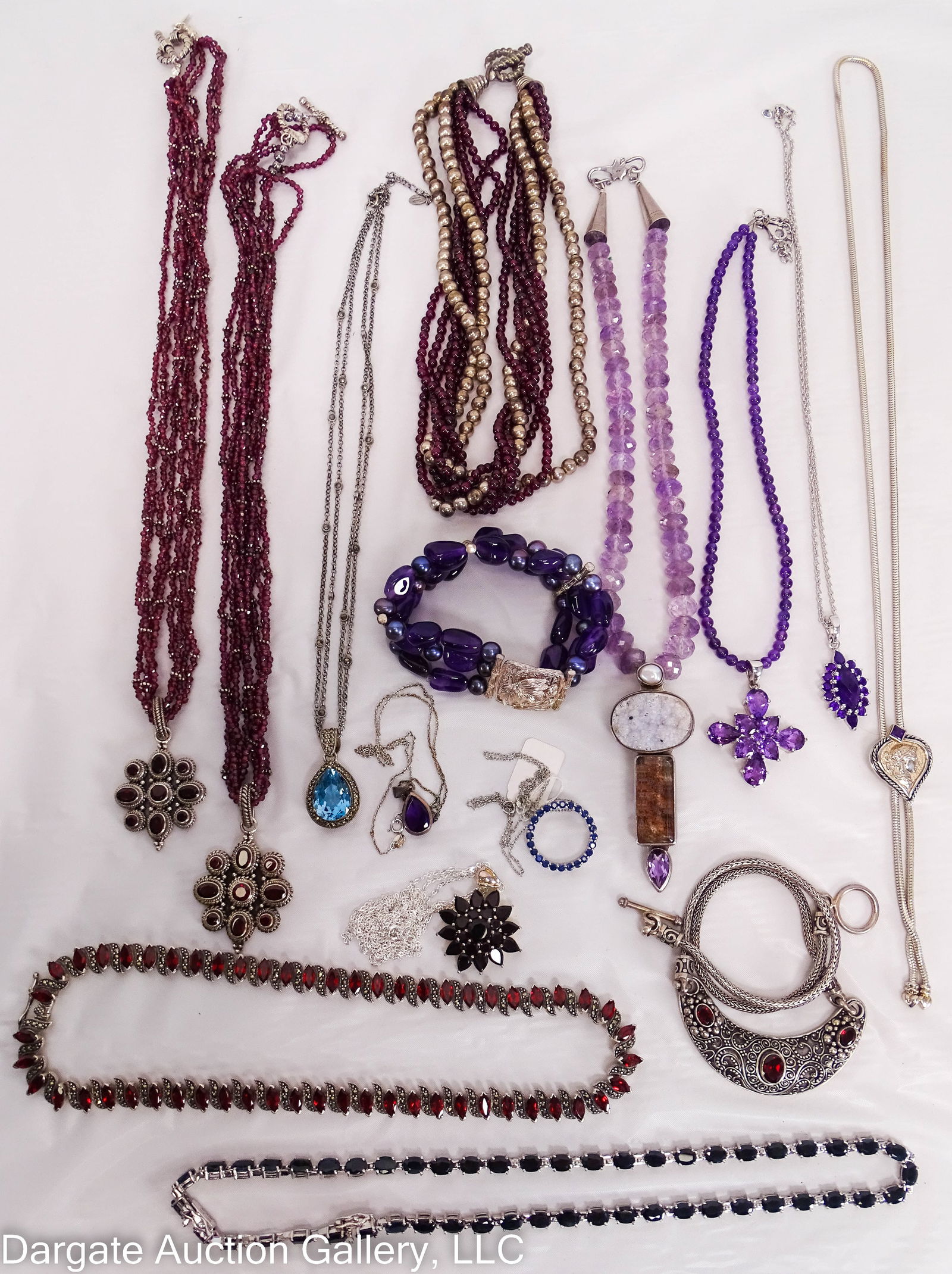 15pc ASST STERLING AMETHYST GARNET TOPAZ JEWELRY: Includes: 16” Multi-strand Sterling and garnet beaded necklace with toggle clasp [JBCO 925]; 18” Sterling chain with Amethyst pendant [925]; BJ Sterling and amethyst beaded stretch bracele