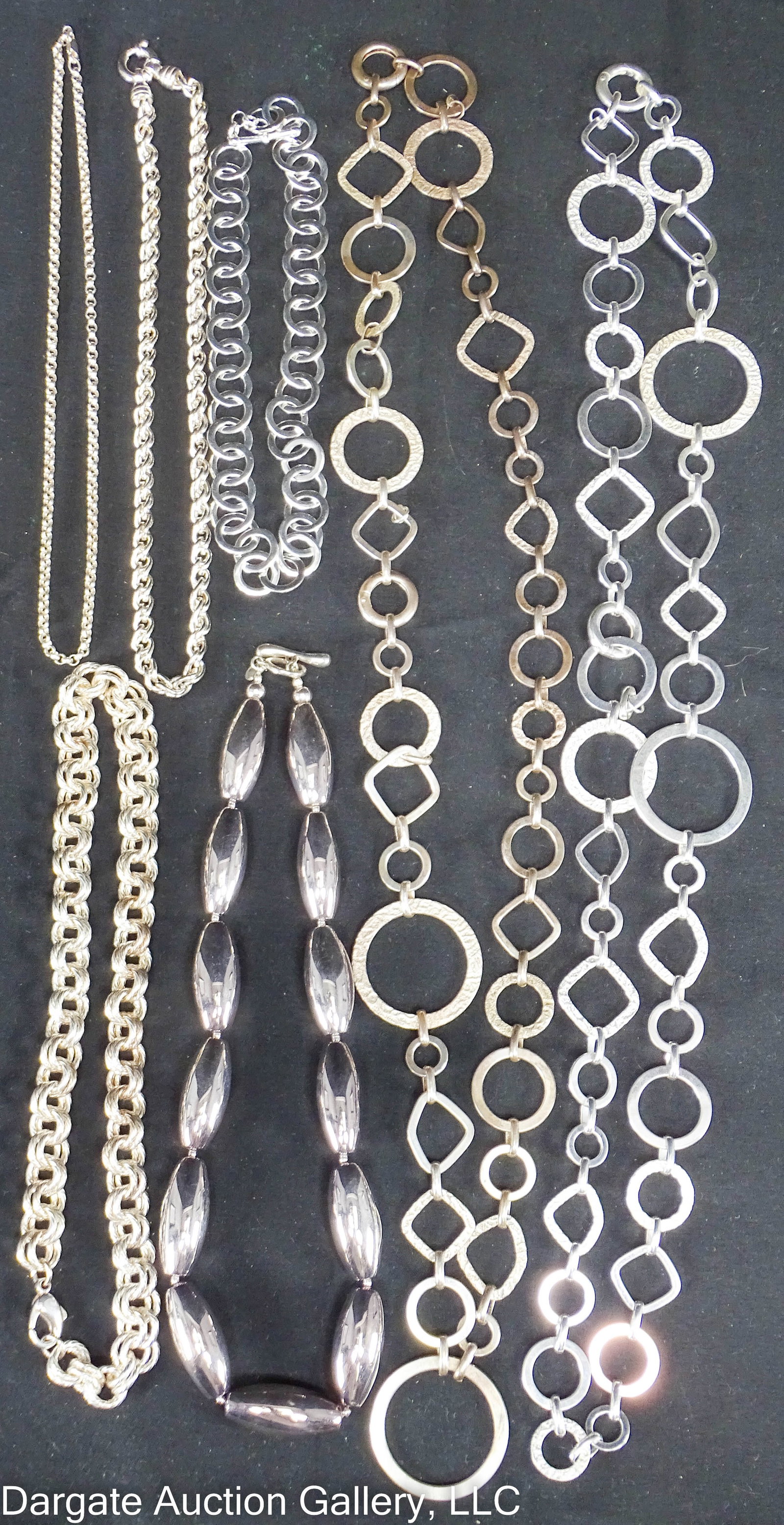 7 ASSORTED STERLING SILVER NECKLACES: Includes: 18" long necklace with elongated beads and toggle clasp [925 LT THAILAND]; 16" long double ring chain necklace with lobster claw clasp [925]; 18" spiga/wheat chain with spring ring clasp [92
