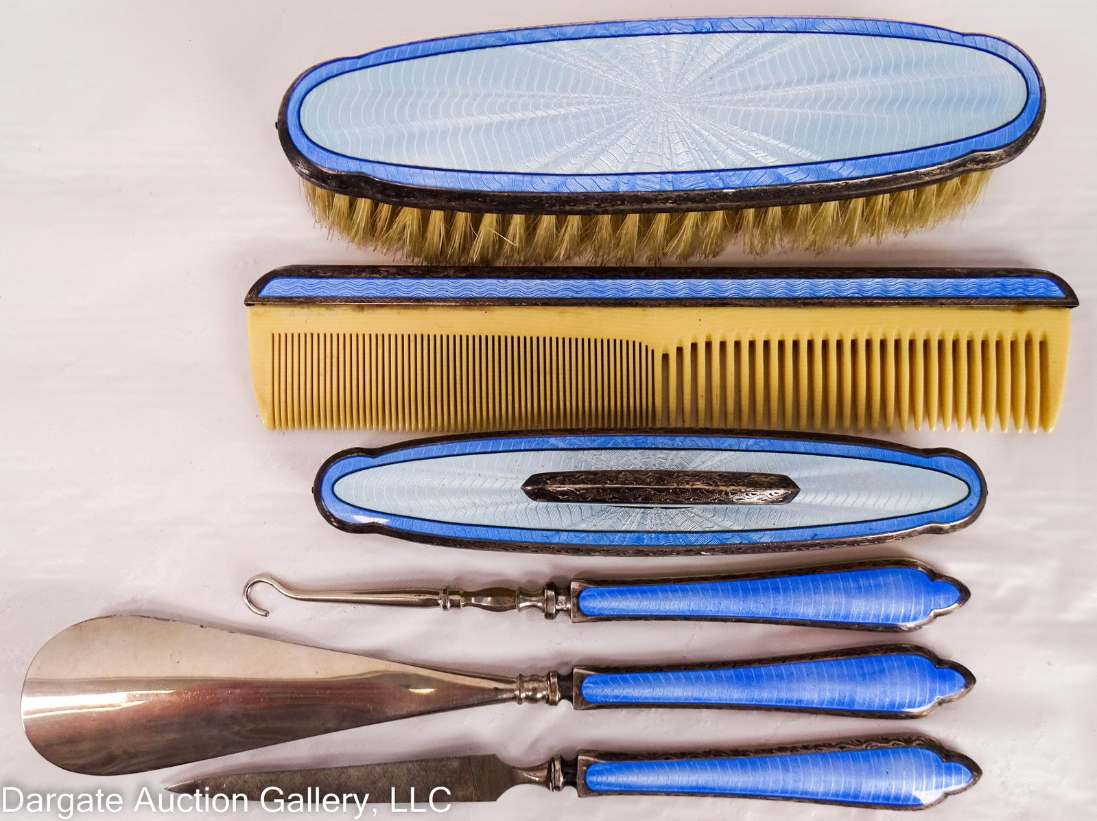 6pc AUSTRIAN STERLING AND BLUE ENAMEL DRESSER SET: Set includes button hook (6.75"L), nail buffer (6"L), shoe horn (8.5"L), nail file (7.5"L), comb (8"L) and clothes brush (6.5"L) / ONLINE PAY MSG ****SEE TERMS AND CONDIT