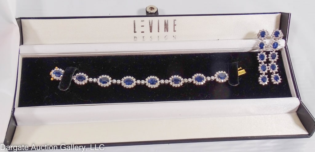 18K DIAMOND & SAPPHIRE BRACELET & EARRING SET: Bracelet is 6"long with 8 cabochon links, each set with an oval cut sapphire surrounded by 13 diamonds, with 2 diamonds linking each cabochon (120 diamonds in total). 8 Sapphires: 6.12mm x 8.15mm each