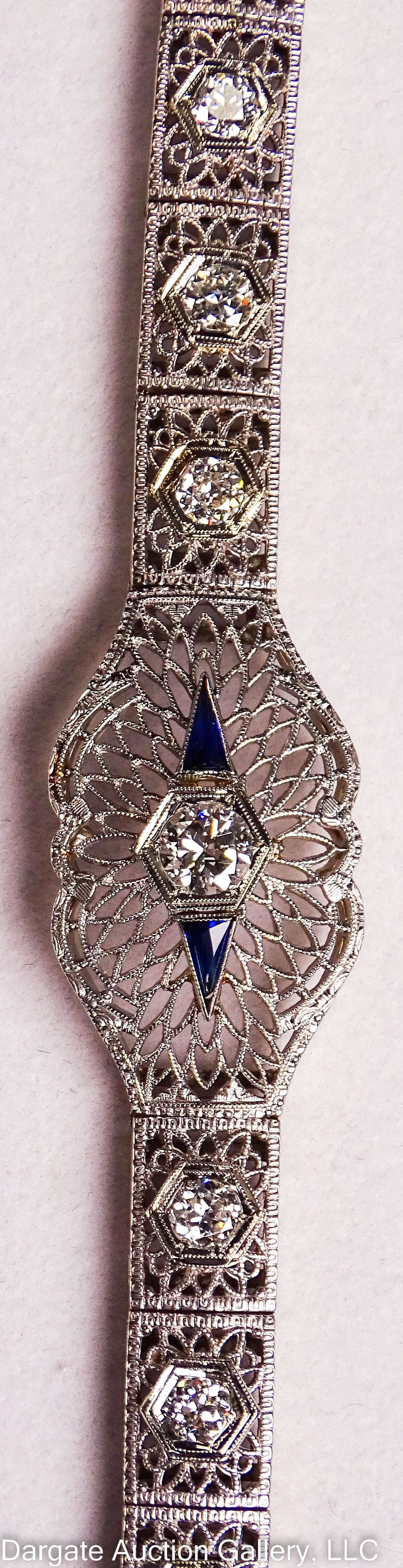 14K FILIGREE DIAMOND & SAPPHIRE ART DECO BRACELET: Antique 14k White Gold Filigree Diamond & Sapphire Art Deco Bracelet - Center has a single diamond with a sapphire on either side; the first 3 links on either side are set with a single diamond, the r