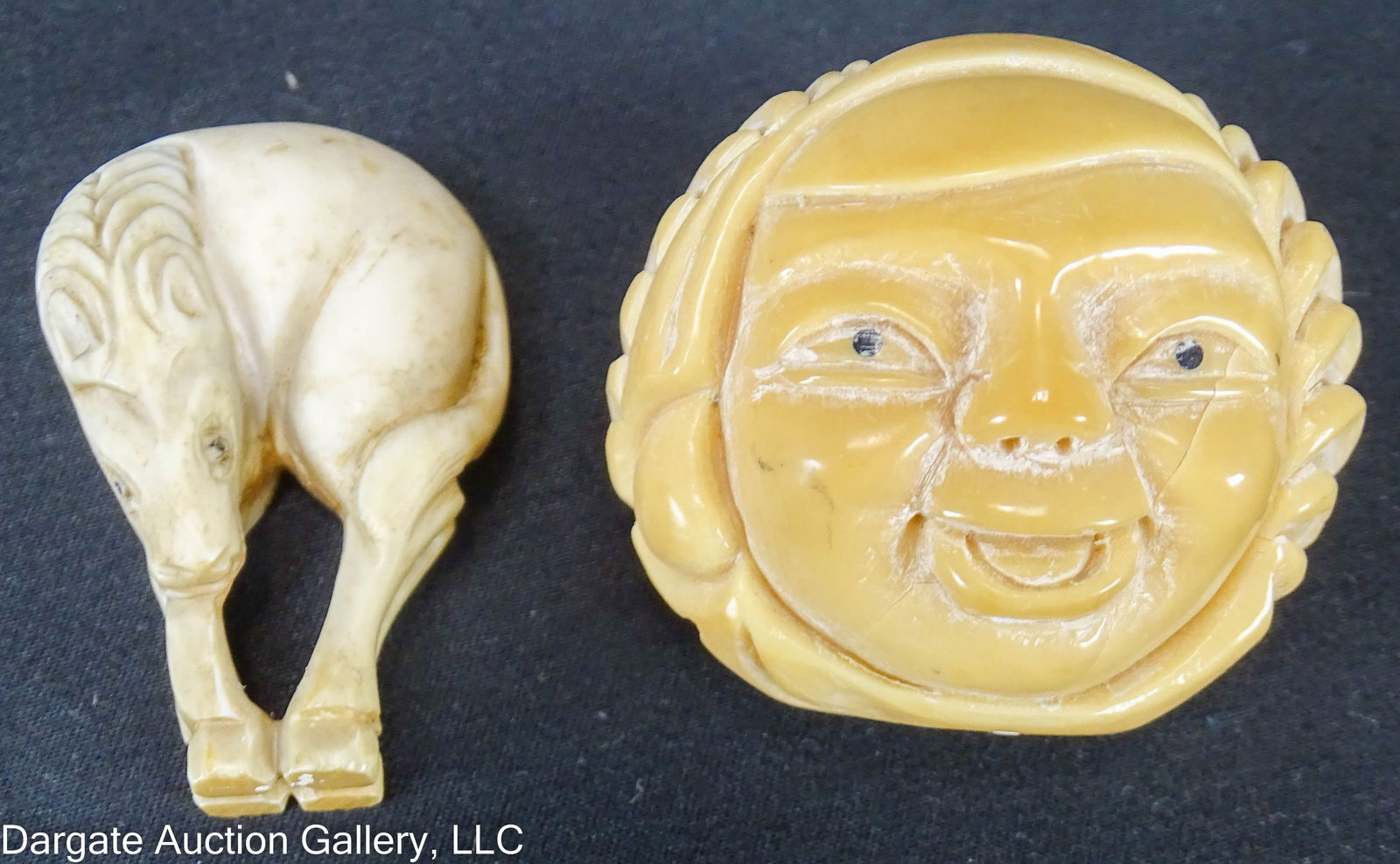 2 CARVED JAPANESE NETSUKES: Includes: (1) Carved bone, signed, grazing horse 1.75"H and (1) Carved tagua nut (holes not drilled in) 1.75" diam/ ONLINE PAY MSG ****SEE TERMS AND CONDITIONS FOR SPECIAL PAYMENT REQUIREMENTS****