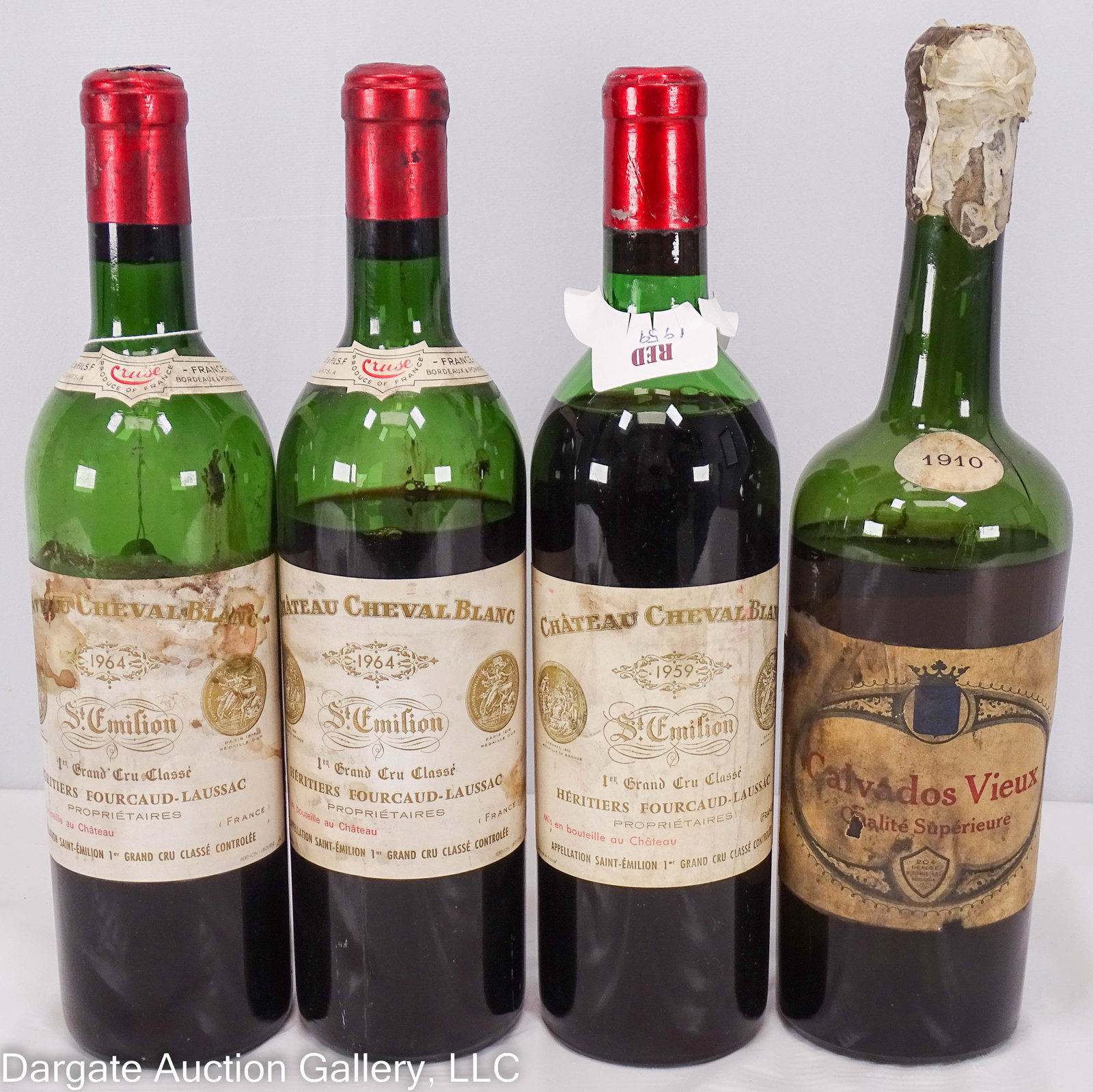 4 WINE BOTTLE INCL CHATEAU CHEVAL BLANC ST EMILION: 4 Wine Bottles Including: (1) 1959 Chateau Cheval Blanc Saint Emilion 1er Grand Cru 750ml Bottle; (2) 1964 Chateau Cheval Blanc Saint Emilion 750ml bottle (1 has a damaged cork, foil broken, not full