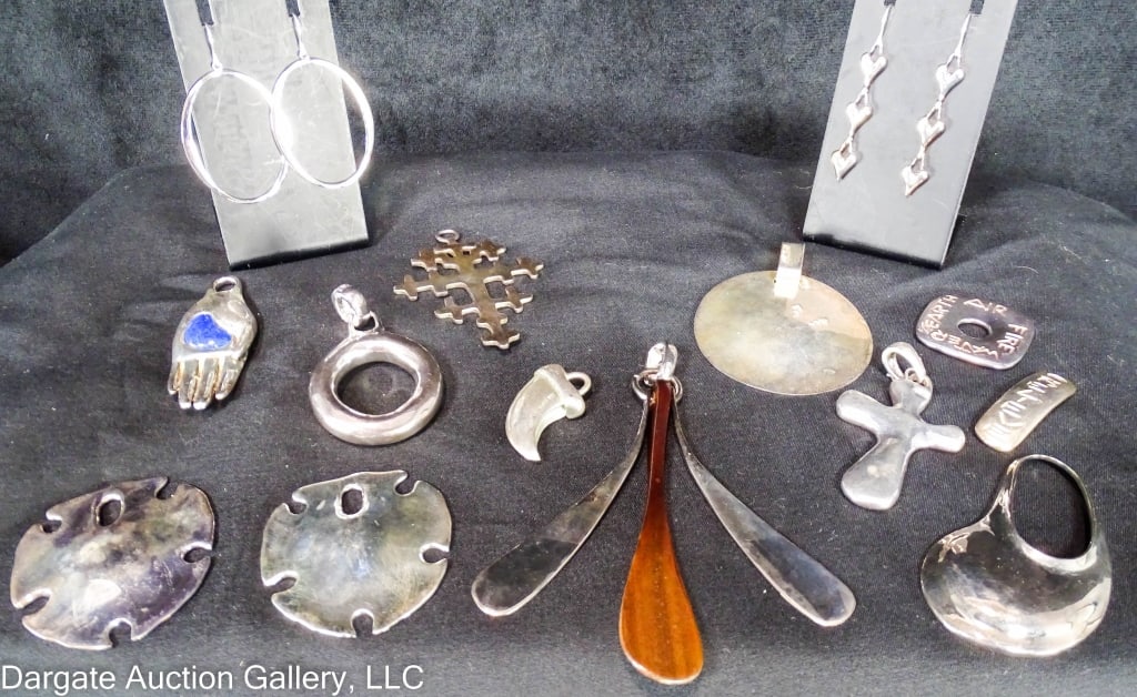 14 RLM STUDIO STERLING PENDANTS AND EARRINGS: Robert Lee Morris Studio Sterling Earrings and Pendants - Includes: (10) Pendants, (2) Pars pierced earrings, (1) Lapis Lazuli pendant & (1) Sterling & wood modernist pendant - All marked [RLM STUDIO