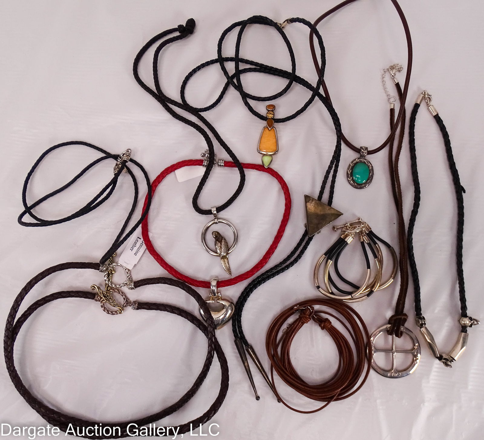 12pcs ASSORTED LEATHER AND STERLING JEWELRY: Includes: (2) 20” Carolyn Pollack braided leather necklaces with sterling & brass toggle clasp; (1) 18” Joseph Esposito braided red leather necklace with sterling lobster claw clasp and st