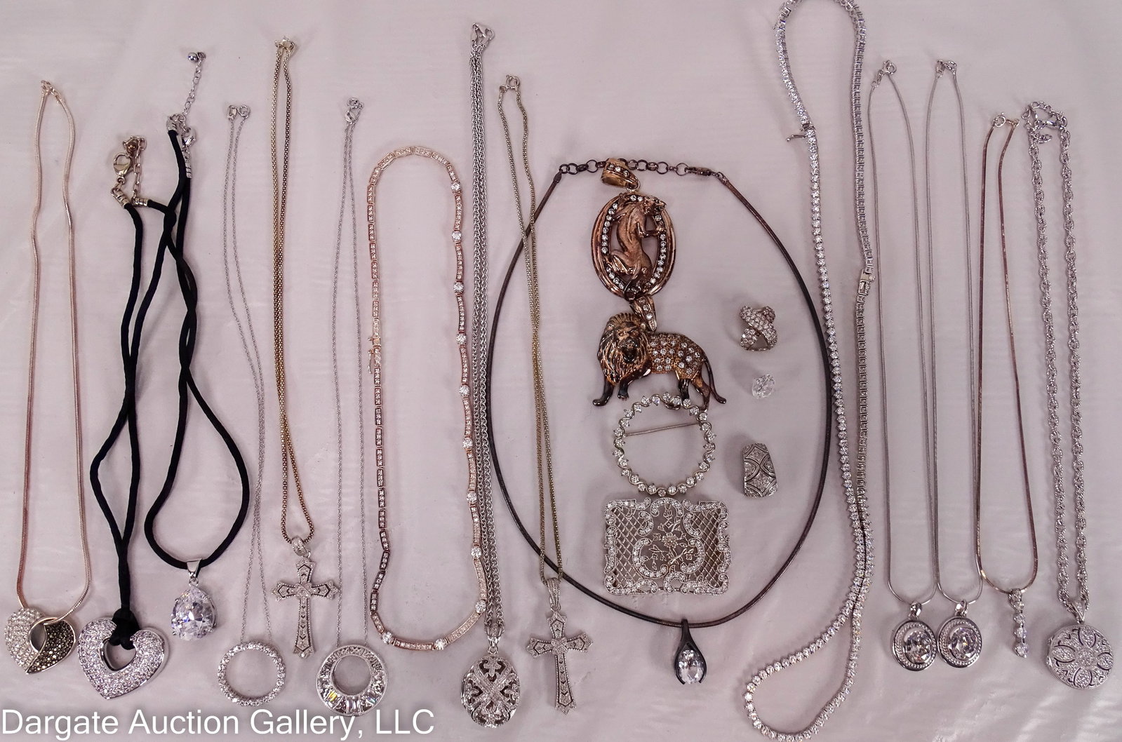 22 CZ AND STERLING JEWELRY ITEMS INC ESPOSITO: All marked [925] unless noted, includes: (2) 18’ snake chains w/CZ pendants, [Italy], pendants .75”L X .25” W; 18” snake chain w/heart slide 1”L X 1”W; panther pendant,