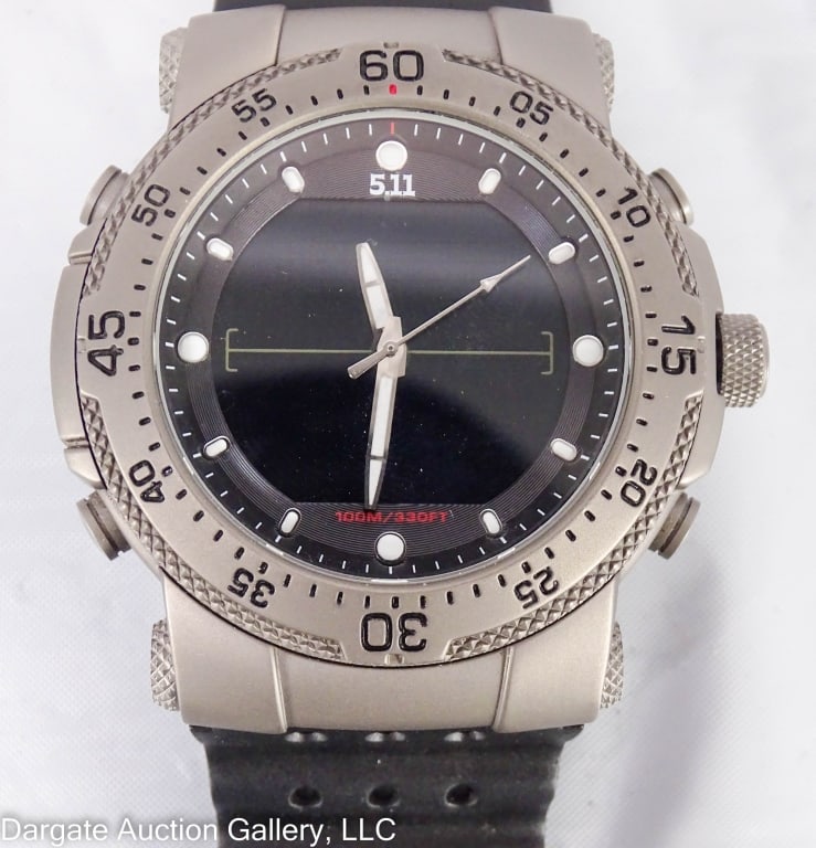 5.11 HRT TACTICAL SERIES TITANIUM SNIPER WATCH: Model No 59209 / 48mm / Titanium 4-screw case / Scratch Resistant Mineral Crystal / Chinese Quartz Movement / Dive Style rubber wrist strap / Includes canvas case with extra black leather strap and al