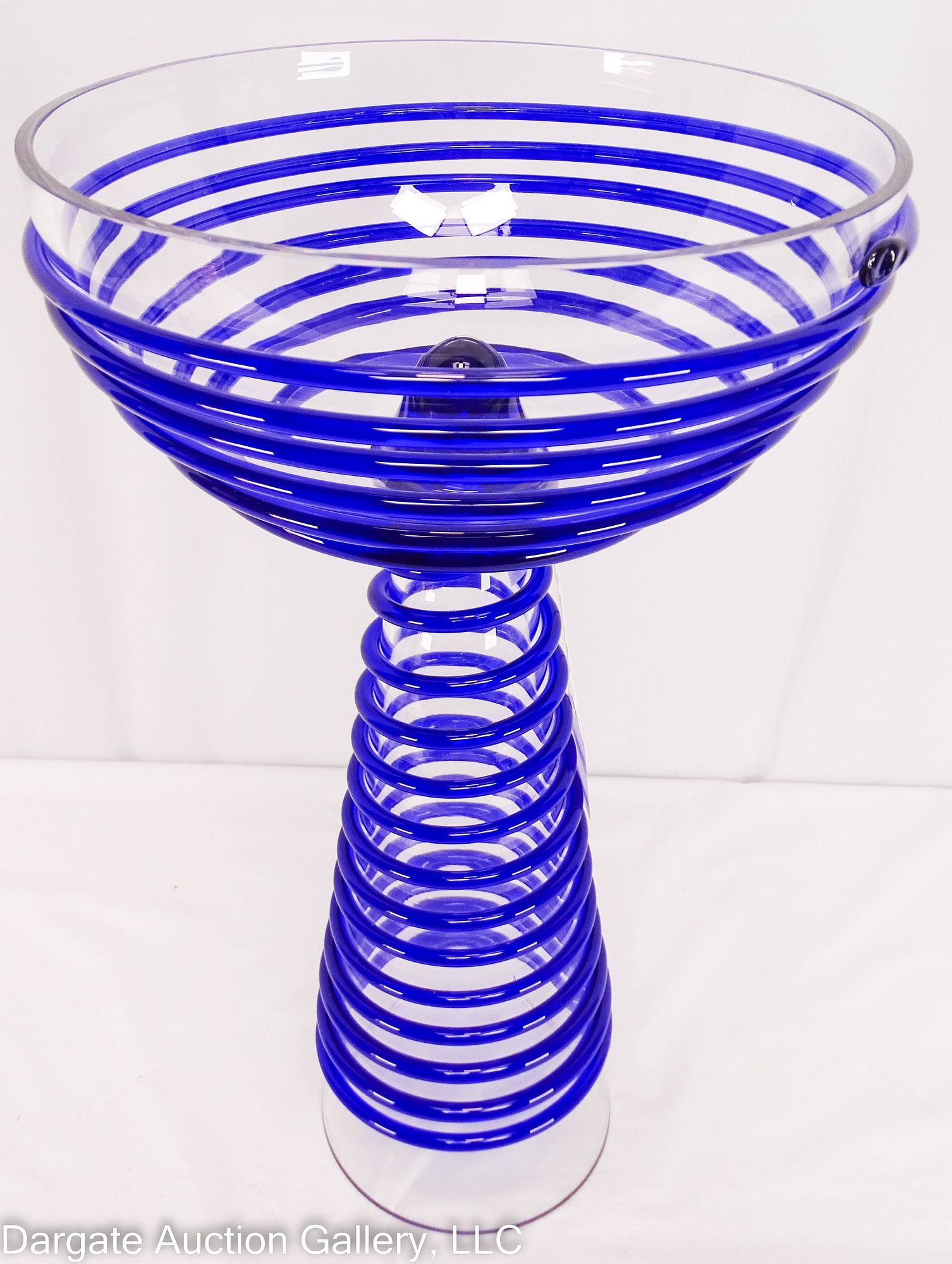 LG CLEAR AND COBALT BLENKO STYLE VASE/CENTERPIECE: An oversized art glass piece, clear with cobalt coils encircling the vase/stem / Measures: 19.75"H x 11" diameter / Condition: Good condition