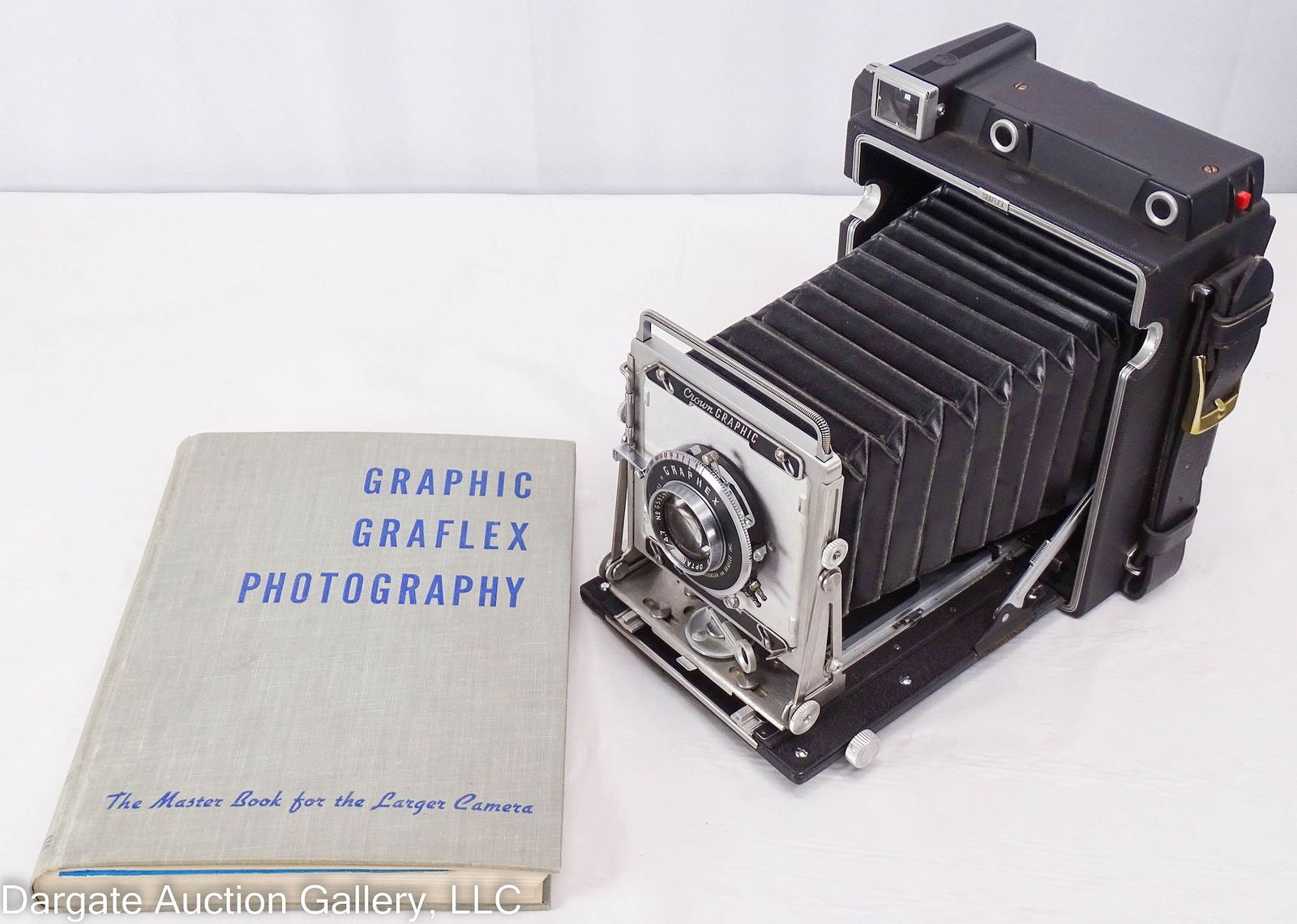 GRAFLEX CAMERA WITH POLAROID LAND FILM HOLDER: Includes: Graflex Graphic Camera with a Polaroid land film holder. Includes Polaroid user manual and the hardback book "Graphic Graflex Photography - The Master Book for the Larger Camera"