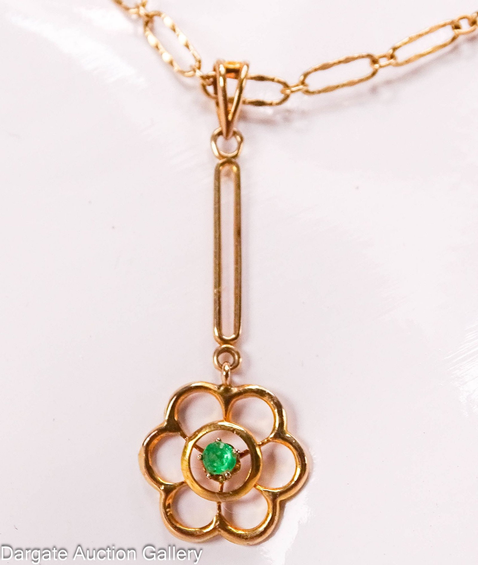 14k YELLOW GOLD LINK CHAIN NECKLACE WITH FLORAL PENDANT: Measures: Necklace - 15"L, marked [585], 3.2g; Drop pendant - floral design with central emerald [10k], 0.7g