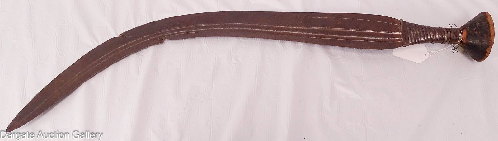 NGBANDI CURVED BLADE SABER: Curved blade saber of the African Ngbandi people. Hand-forged iron blade made of two pieces of iron (possibly broken and repaired). Metal-wrapped handle with a flat-top wooden hilt; blade edges are sh