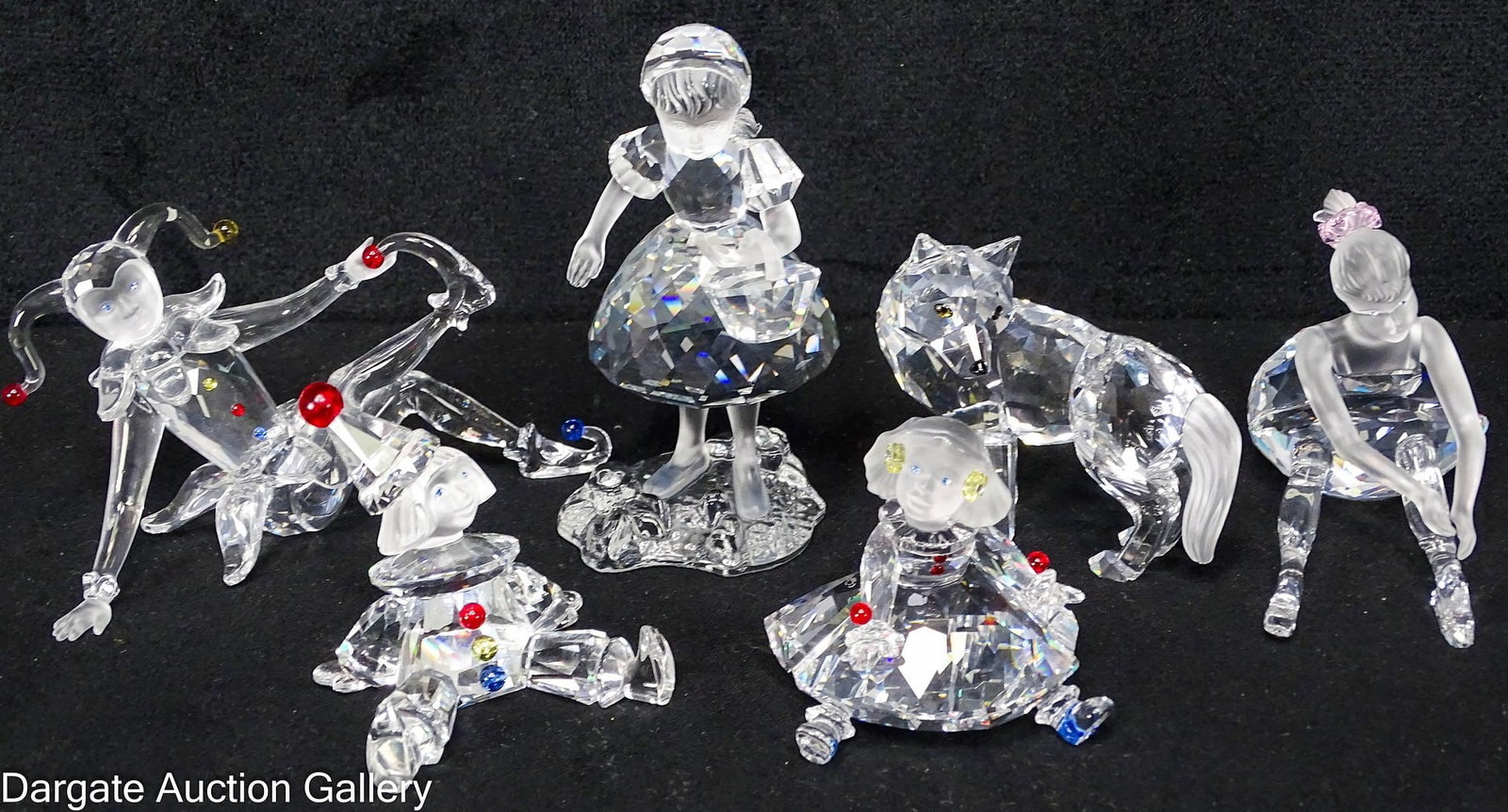 (6) ASST SWAROVSKI CRYSTAL FIGURES incl RED RIDING HOOD: Includes: Little Red Riding Hood with a detachable basket, the Big Bad Wolf, a court jester, a ballerina and a male & female clow figure; Measures: 1.75"H to 3.25"H
