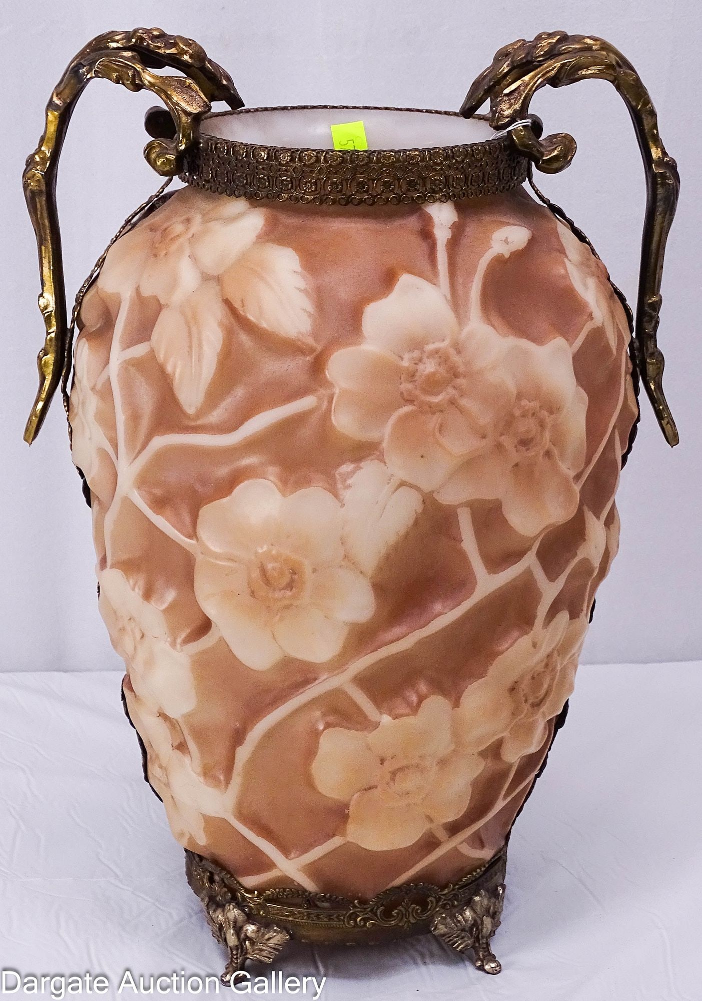 PHOENIX CONSOLIDATED ART GLASS DOGWOOD VASE: 10" Phoenix Consolidated Art Glass Dogwood vase with painted bronze mounts, the 4 feet have a silver toned finish; Measures: 12.5" overall, 2" across the handles, 6.5" diameter