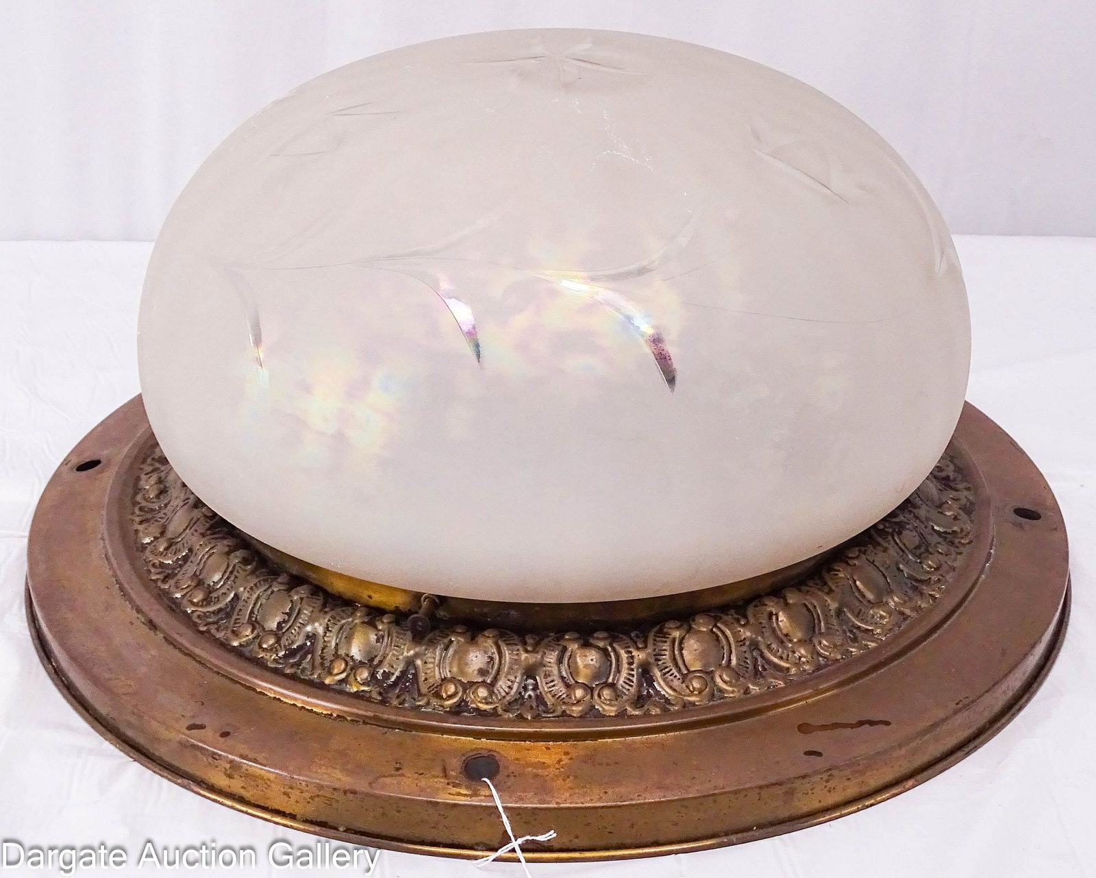 ART NOURVEAU FLUSH MOUNT CELING LIGHT FIXTURE: Stamped brass fixture frame with an etched frosted iridescent dome shade; Measures: Brass fixture - 2"H x 15.75" diameter; Shade - 5.5"H x 10.5" diameter, 9.75" fitter;