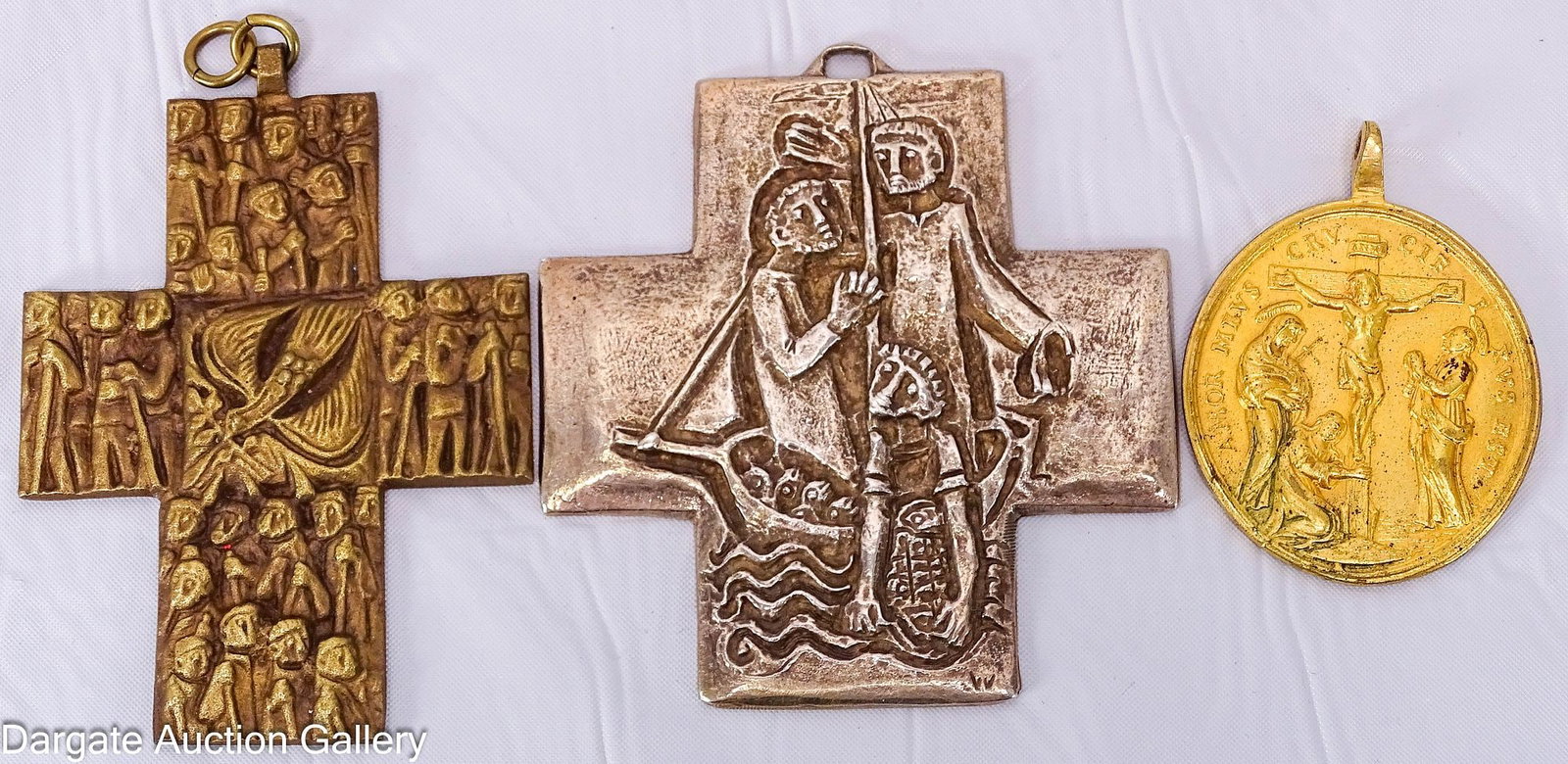 (3) RELIGIOUS MEDALS incl EGINO WEINERT: Includes: Oval Passion of Christ/Stations of the cross, 1.75"H x 1.5"W Cross Depicting Pentecost - front depicts, in relief, a large group of people with a central dove, representing