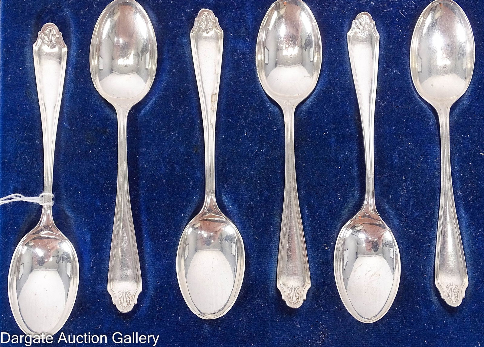 (6) CASED ENGLISH STERLING DEMITASSE SPOONS: Marked for [Birmingham, Sterling, 1917]. Case for retailer marked [96 Grafton Street, 1, 2, and 3 Wicklow Street Dublin, and 33 Donegall Place, Belfast, Weir & Sons].. / Dimensions: