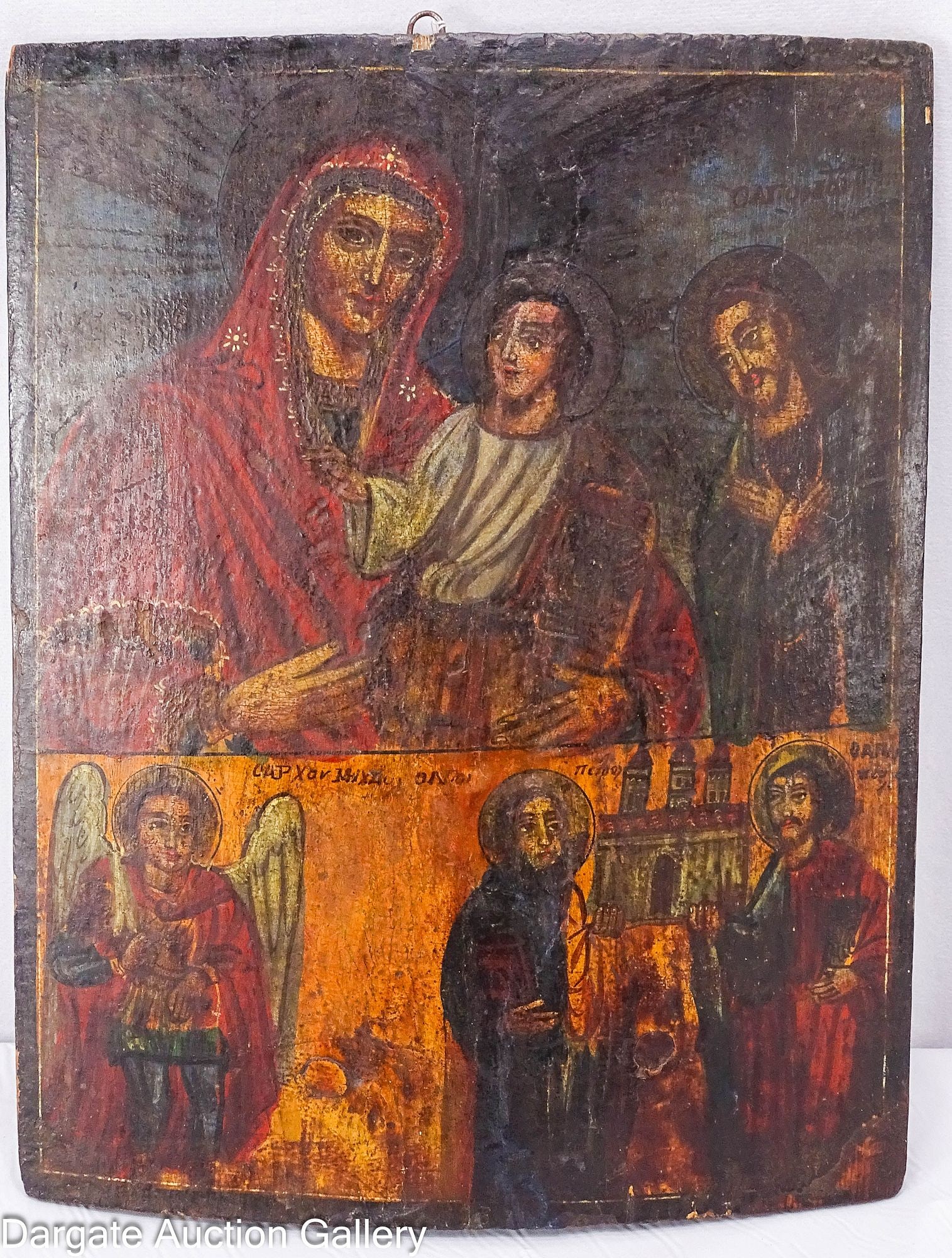2-TIER GREEK ORTHODOX ICON ON CURVED WOOD PANEL: A two-tier Greek Orthodox icon on curved wood panel from the first half of the 20th century. The top scene depicts the Hodegetria (Mary holding the Christ child), and the bottom shows a Deesis scene