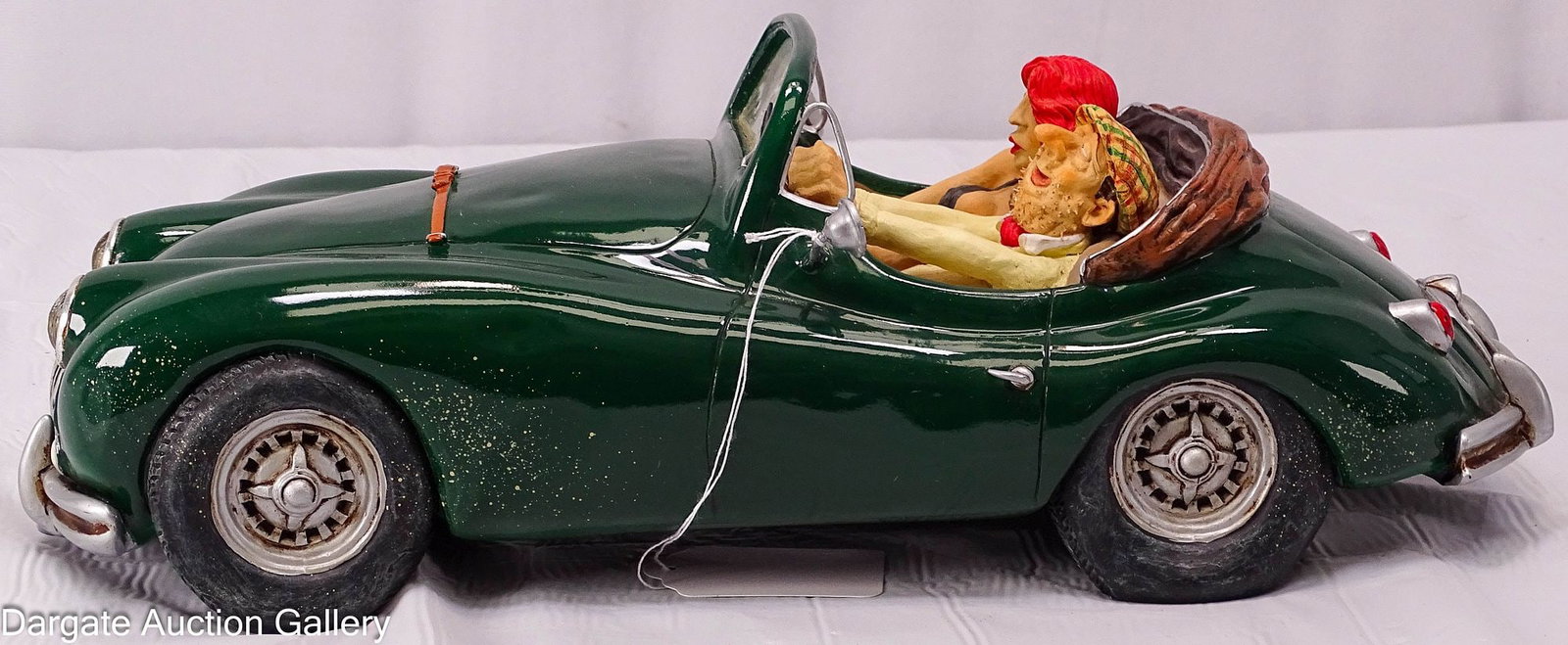 GUILLERMO FORCHINO 2004 LE REVE/THE DREAM: Guillermo Forchino (Argentina, b. 1952) was known for his comic art. This piece depicts a green convertible driven by an unshaven wealthy man, with a buxom red head next to him; Measures: 5"H x