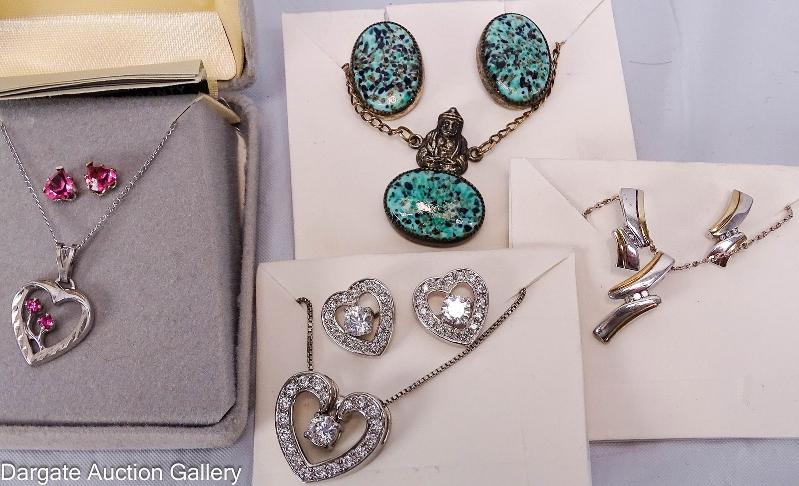 (4) ASSORTED NECKLACE & EARRING SETS incl STERLING: Includes: Sterling heart shaped pendant and pierced earring set all decorated with pink crystals; Chain - 19"L [STG K] Pendant - [STERLING], Pierced Earrings - [925 HAB STG] Sterling
