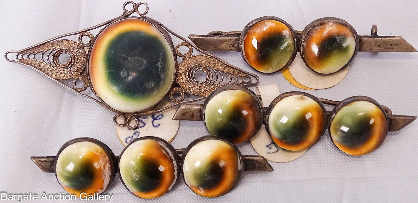 (4) VICTORIAN OPERCULUM SHELL CATS EYE PINS (1 of 4)