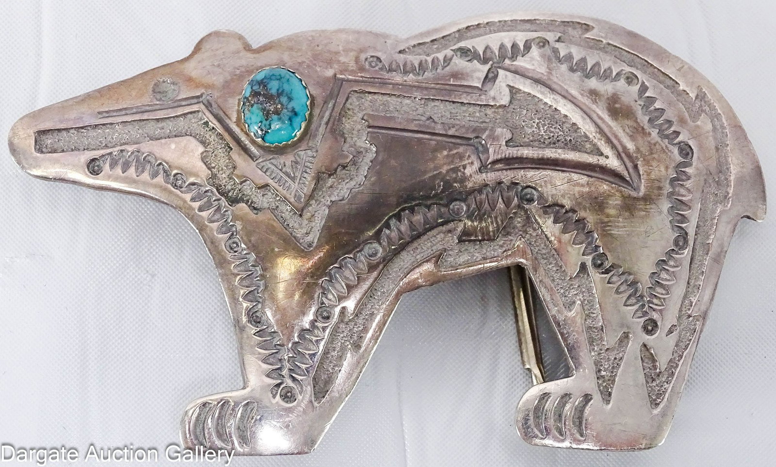 JAMES SHAW NAVAJO STERLING TURQUOISE BELT BUCKLE: Native American Southwestern style; features a bear with inlaid turquoise [STERLING] [JS]; Measures: 2"H x 3.5"W, Total Gross Weight - 53.1g