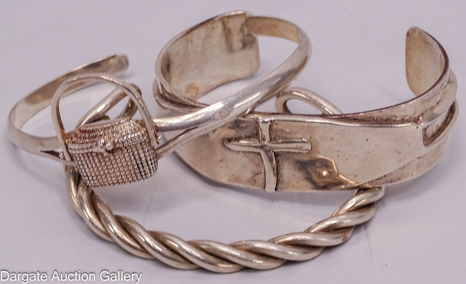(3) STERLING SILVER CUFF BRACELETS: All marked [925]; Includes: twisted rope design, 2.5" inner width, 1.5" opening basket design, 2" inner width, 1.5" opening cross, 2.75" inner width, 1.5" opening T