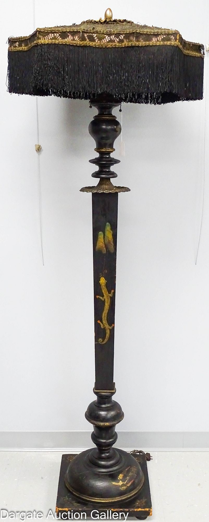 1920s CHINOISERIE FLOOR LAMP with FRINGED SHADE: Large wooden floor lamp with a black lacquer finish, decorated with hand painted Oriental motifs; the large square base sits on (4) bun feet and had hand painted floral designs painted in the corners 