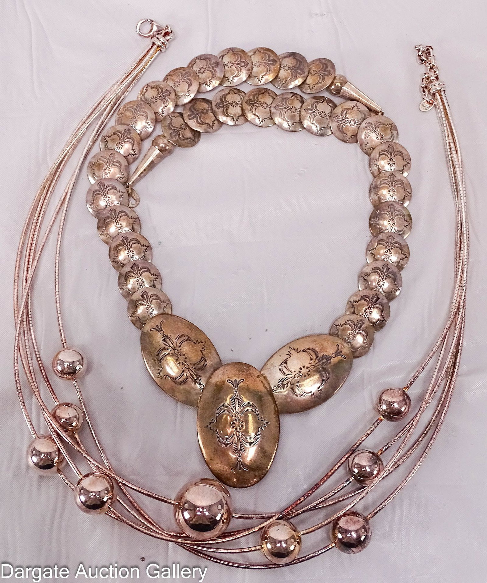 (2) STERLING SILVER NECKLACES: Includes: Carolyn Pollack pillow bead Southwestern necklace, lobster claw clasp [925]; 18"L, 50.7g Liquid Silver and beaded multi-strand necklace [925]; 17-20"L, 67.7g] Total Gross Wei