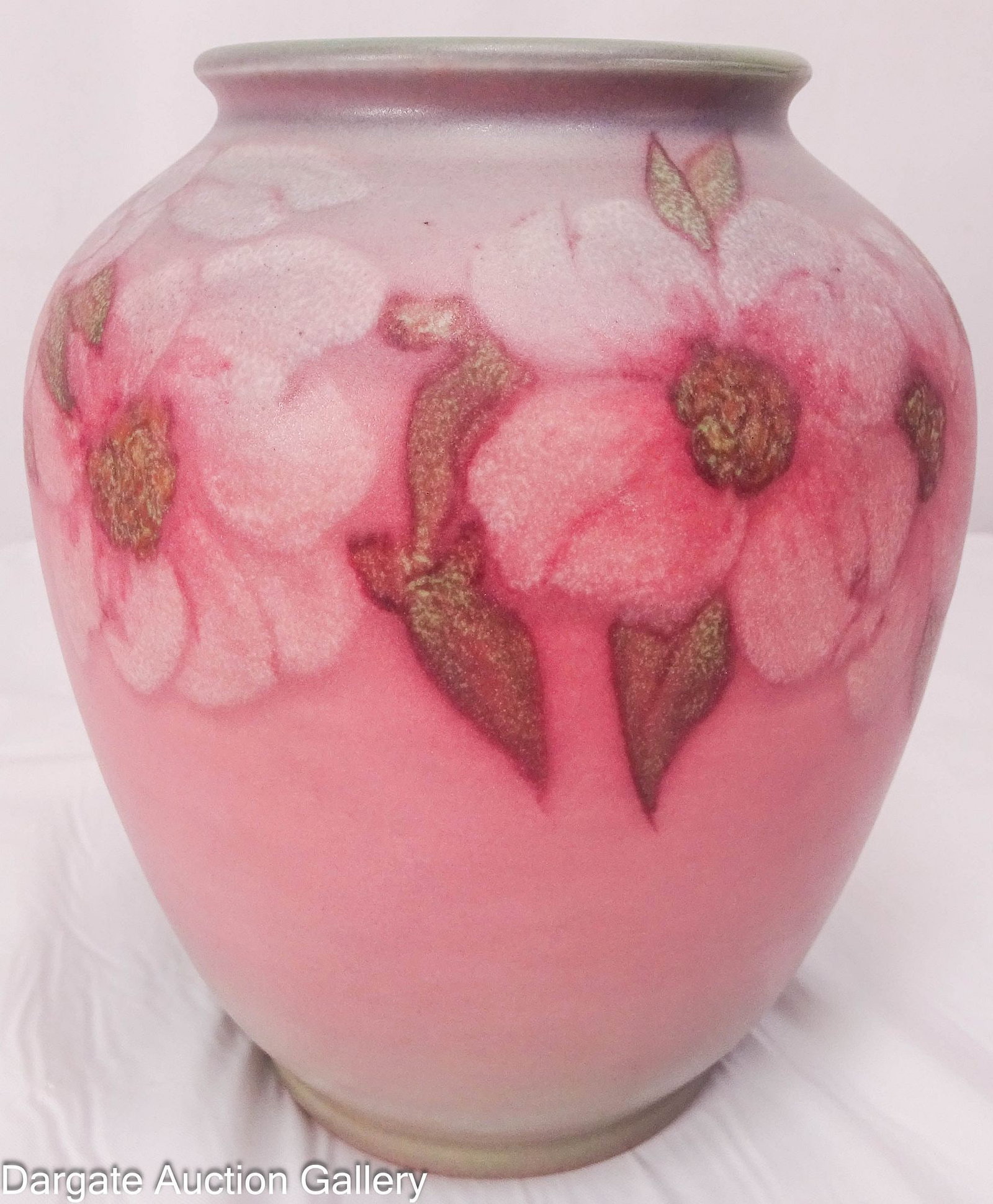ROOKWOOD VELLUM FLORAL VASE 1931 SARA SAX: Base has Rookwood mark, 1931, Model 6201D, with initials for Sara Sox. A vellum glazed floral piece in delicate shades of blue and pink; Measures: 6.5"H x 6" diameter