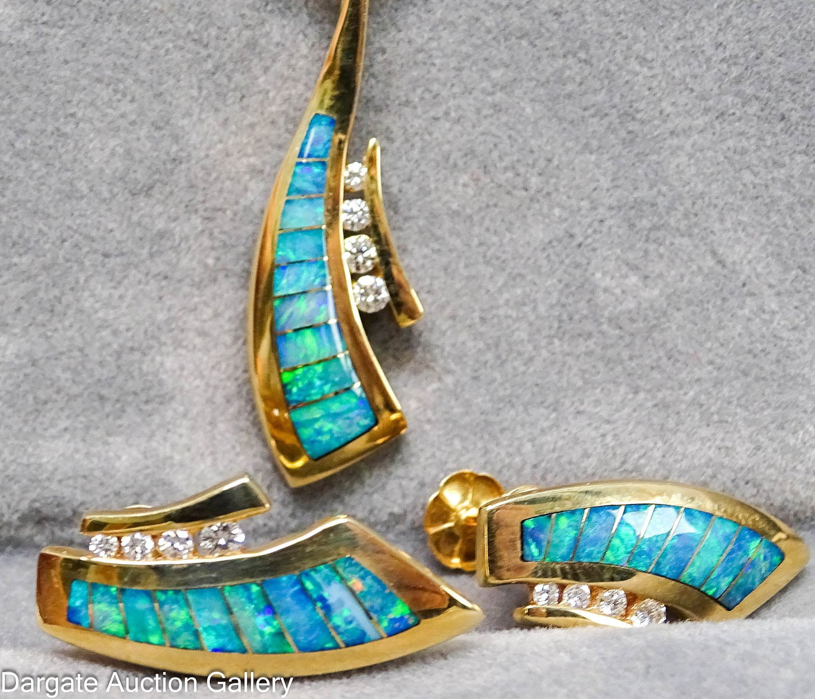 14k YELLOW GOLD DIAMOND AND OPAL JEWELRY SET: Retailed by Beeghly & Deim; Set includes: Pair of screw back earrings in 14k yellow gold set with (4) graduated sized diamonds and (9) opals (each) 18"L 14k yellow gold snake chain necklace w
